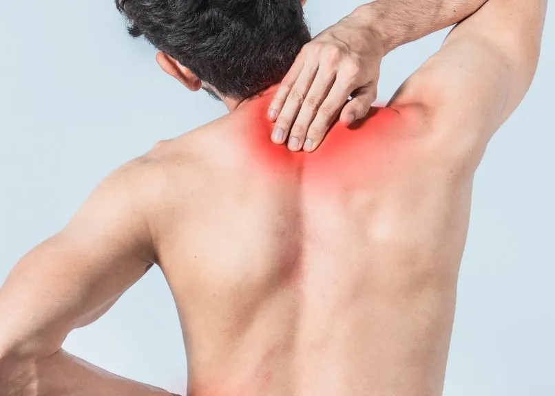 upper-back-pain https://www.triaxisclinic.com/wp-content/uploads/2025/02/upper-back-pain.jpg